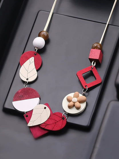 Collier géométrique en bois tissé pour femme