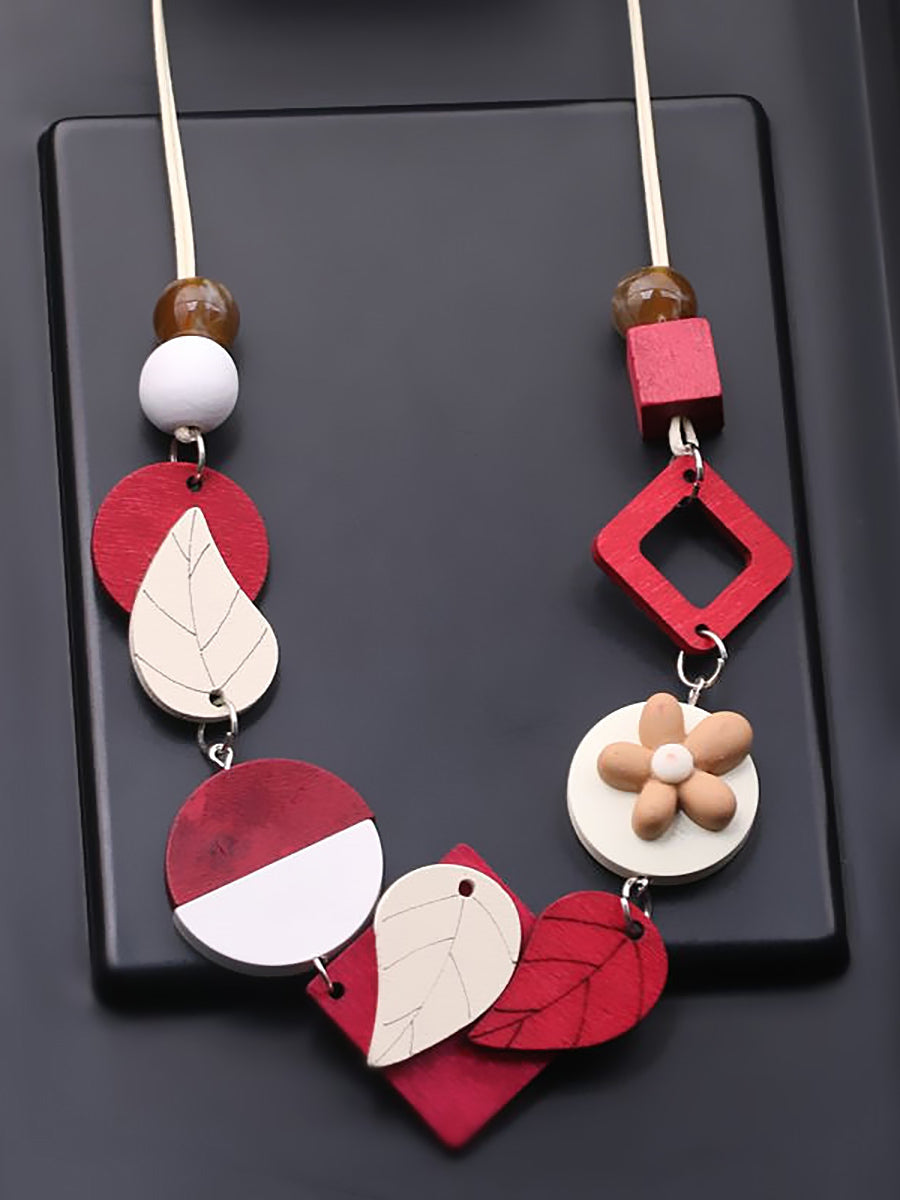 Collier géométrique en bois tissé pour femme
