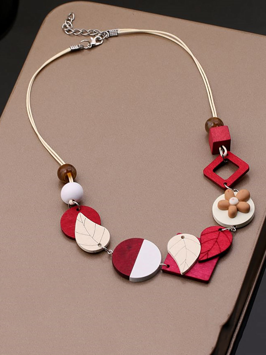 Collier géométrique en bois tissé pour femme