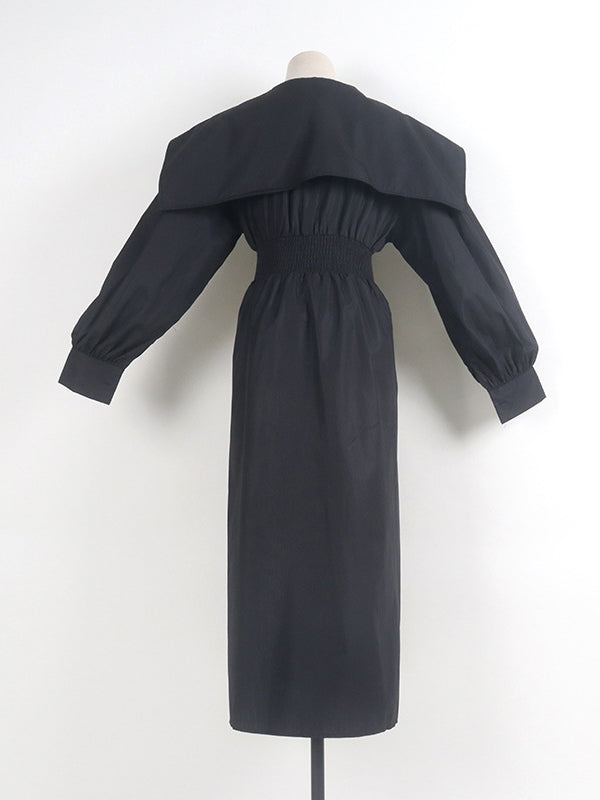 Robe longue noire plissée asymétrique à revers et ceinture moderne 