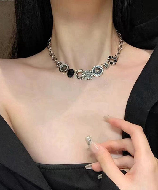 Collier de perles en zircon avec bouton en alliage