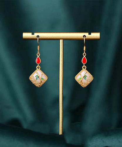 Boucles d'oreilles pendantes en forme de feuille de bambou avec pierres précieuses en jade et cuivre doré KX1090