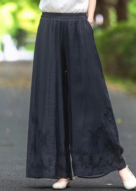 Pantalon d'été noir élastique à poches en soie et taille brodée