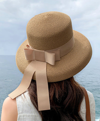 Chapeau de soleil de plage en paille tissée avec nœud noir Boutique II048
