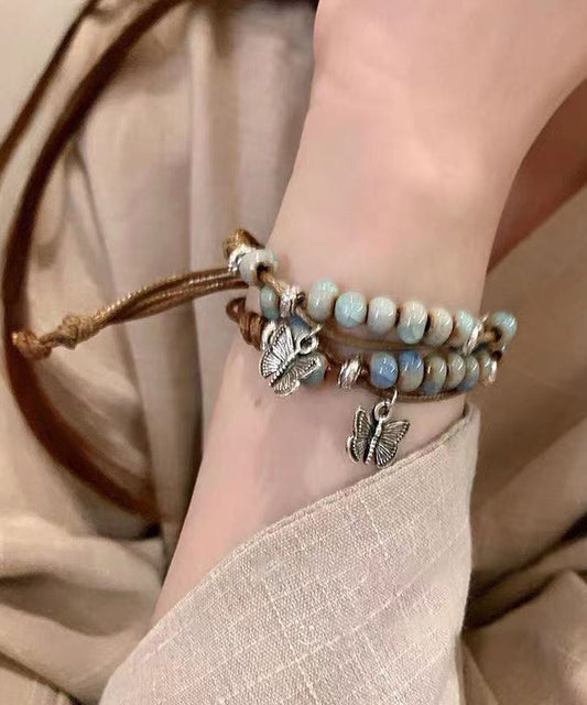 Ensemble de deux bracelets à breloques papillon en céramique tissée en alliage décontracté TX044
