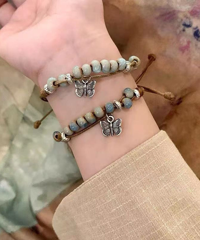 Lässiges Legierungsweben Keramik Schmetterling Charm Armband Zweiteiliges Set TX044