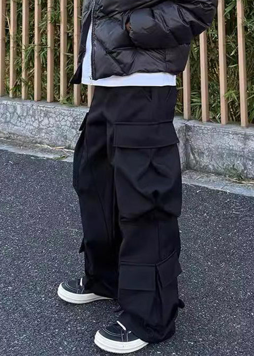 Pantalon décontracté pour homme avec poches à la taille et boutons noirs en coton