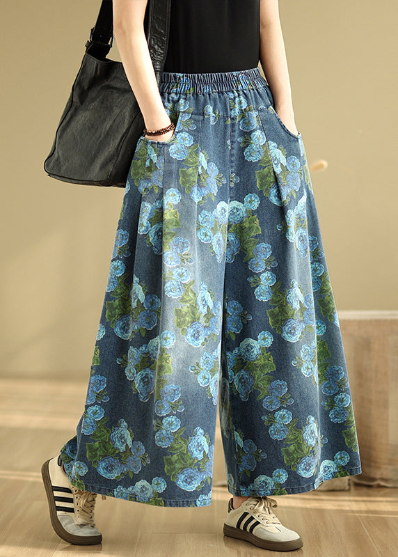 Pantalon bleu décontracté en denim à larges poches et imprimé, coupe tombante