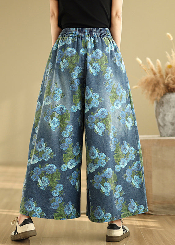 Pantalon bleu décontracté en denim à larges poches et imprimé, coupe tombante