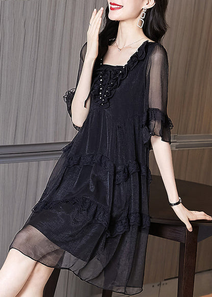 Schickes schwarzes Chiffon-Patchwork-Kleid mit Rüschen