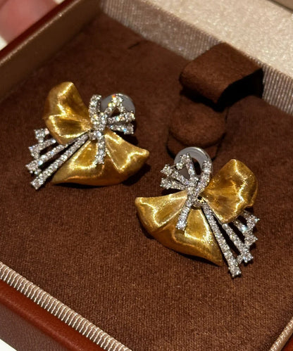 Chic Gold Copper Zircon Asymmetrical Bow Stud Earrings YD002