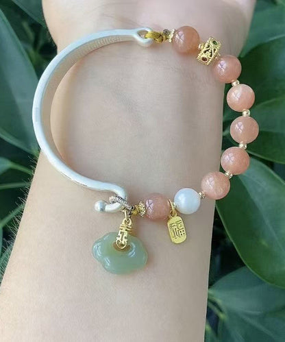 Bracelet à breloques chic en argent sterling rose incrusté de jade et de nuages ​​de bon augure QD020