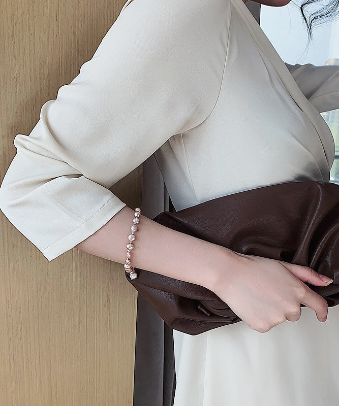 Schickes weißes Legierungsperlen-Quasten-Charm-Armband ET013