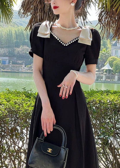 Robe d'été en coton noire élégante à col en V et perles à clous XX013