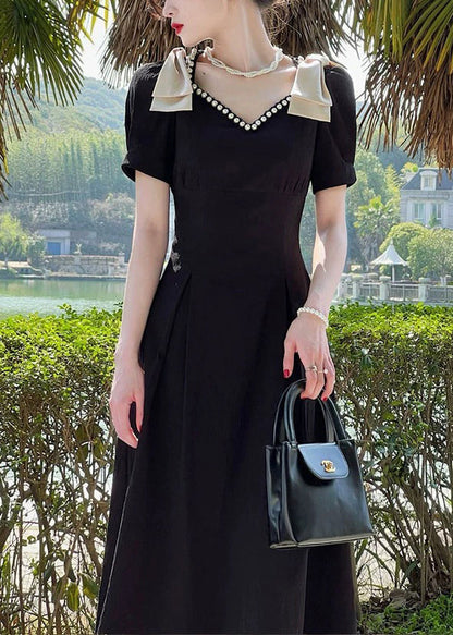 Robe d'été en coton noire élégante à col en V et perles à clous XX013