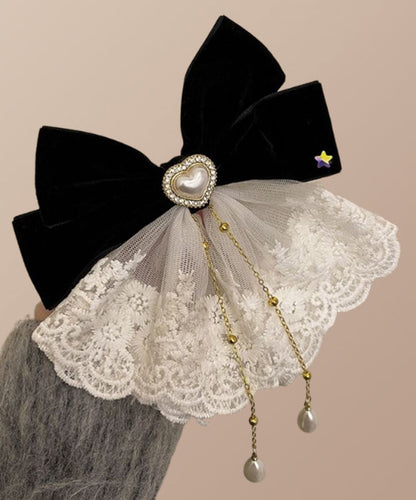 Épingle à cheveux en alliage de cristal avec pompon et nœud rouge élégant