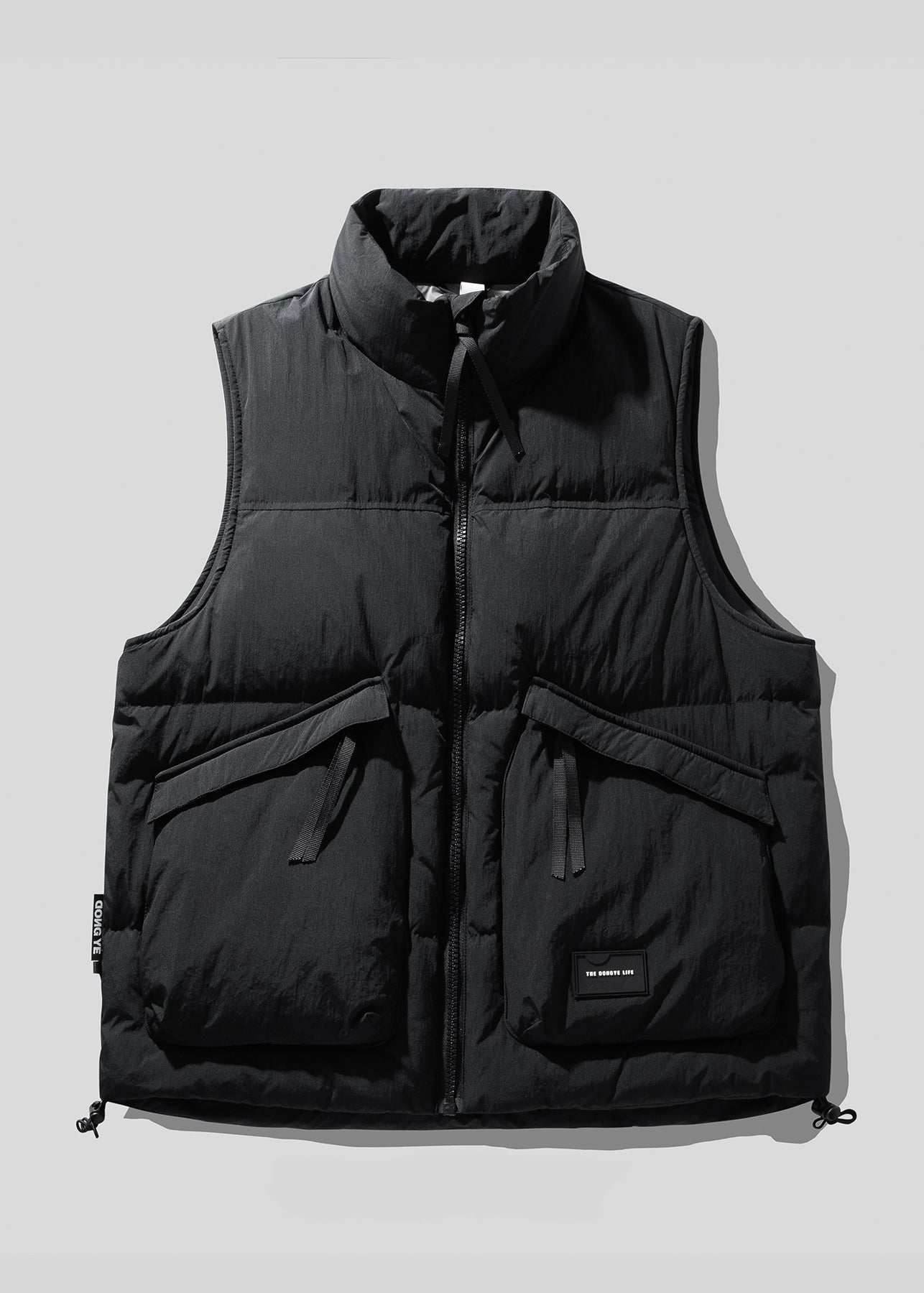 Coole braune Stehkragen-Reißverschluss-Entendaunenwesten für Herren im Winter TK022
