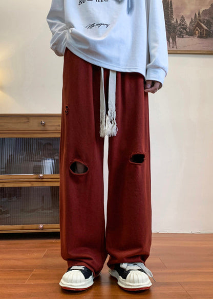 Pantalon long rouge déchiré pour homme, surdimensionné et creux, idéal pour le printemps