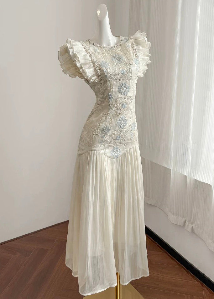Elegantes, besticktes Patchwork-Kleid in Aprikosenfarbe
