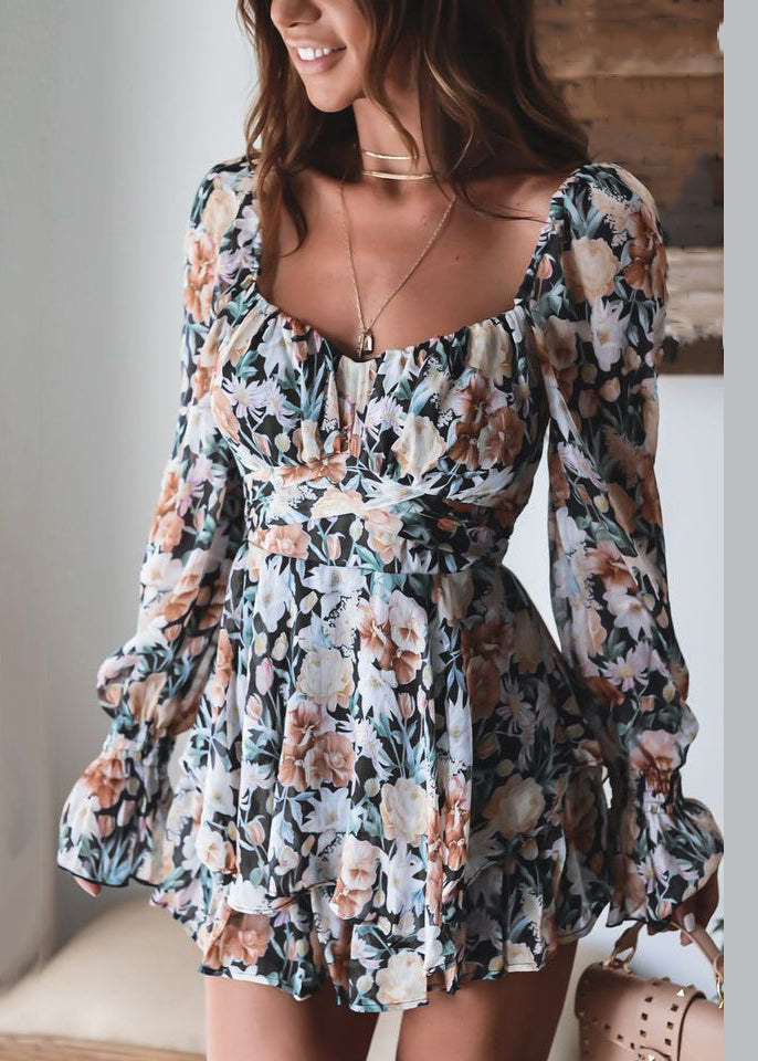 Combinaison rose élégante à imprimé printanier et fermeture éclair avec dentelle