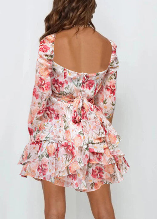 Combinaison rose élégante à imprimé printanier et fermeture éclair avec dentelle