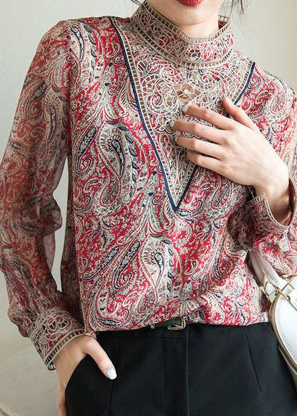 Chemise en mousseline de soie bleue à imprimé brodé et manches lanternes TZ039