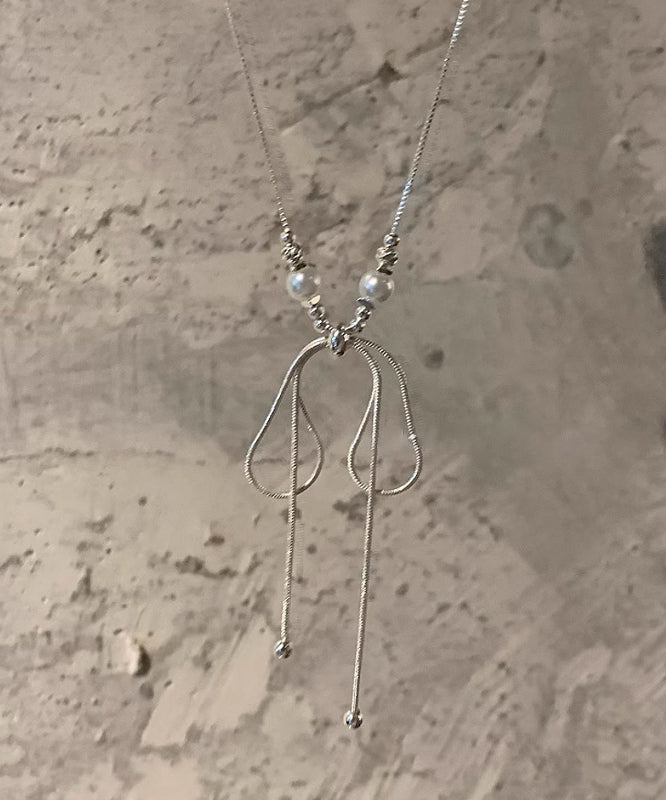 Collier avec pendentif en forme de nœud en alliage de soie fine et perles YU002