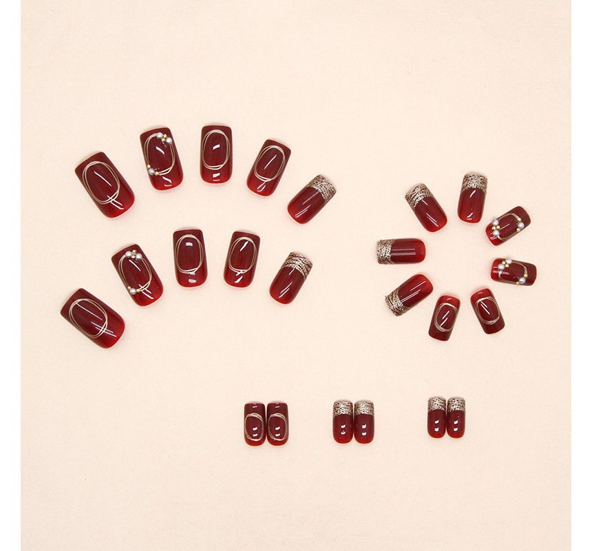 Kunstnägel mit Strasssteinen