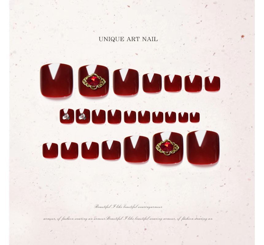 Zehennagelspitzen mit Strasssteinen