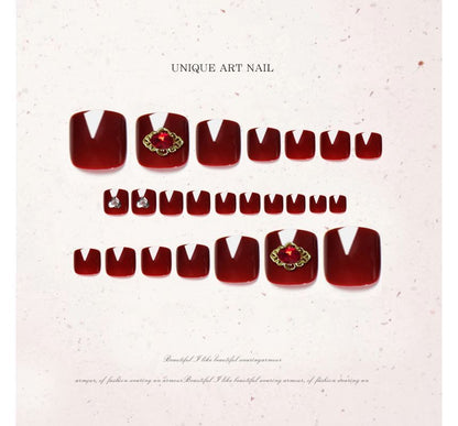 Zehennagelspitzen mit Strasssteinen