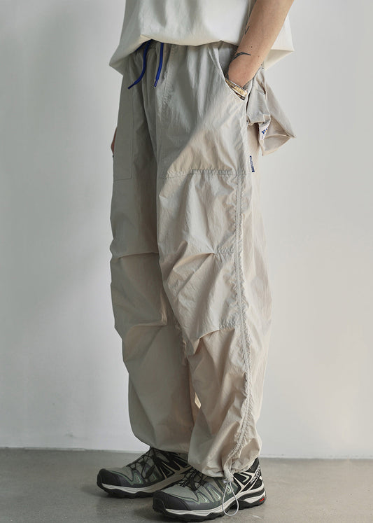 Pantalon d'été léger en coton avec poches à la taille et élastique gris pour homme
