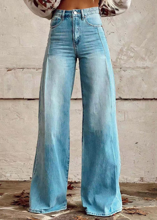 Pantalon ample taille haute en denim bleu avec poches à boutons légers