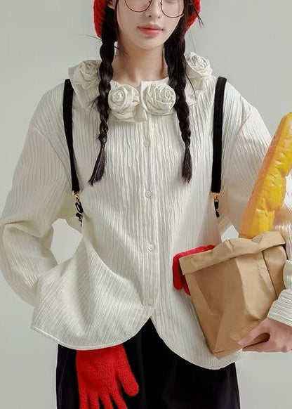 Chemise ample en coton à boutons blancs et imprimé floral