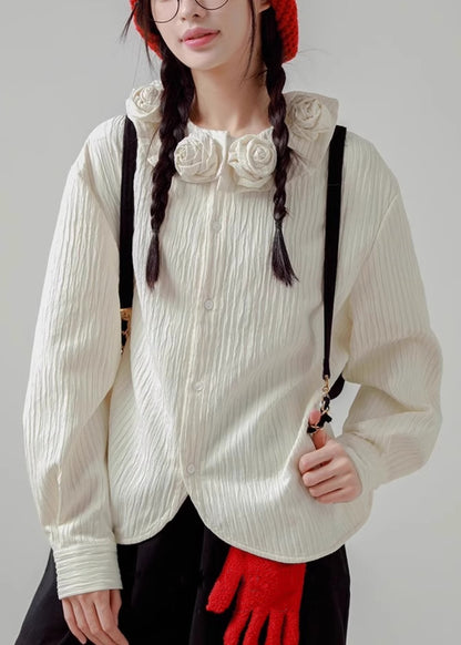 Chemise ample en coton à boutons blancs et imprimé floral