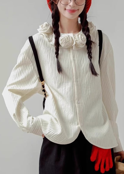 Chemise ample en coton à boutons blancs et imprimé floral