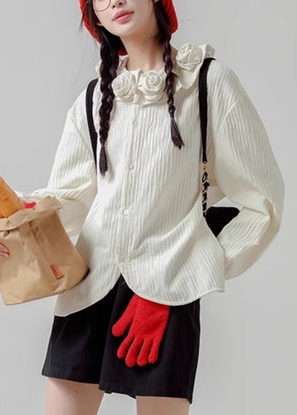 Chemise ample en coton à boutons blancs et imprimé floral