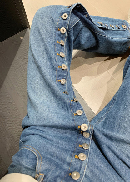 Pantalon bleu asymétrique taille droite en denim, bouton moderne haut