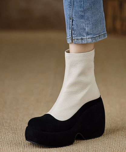 Neue schwarze Stiefeletten mit Keilabsatz und Reißverschluss aus Schaffell RX013