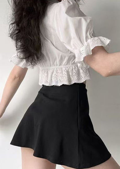 Chemise d'été blanche en coton brodée à lacets creux