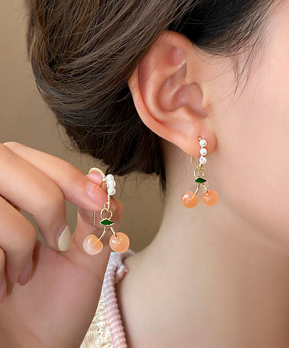 Boucles d'oreilles créoles fantaisie en alliage de cuivre orange et perles de cerisier WH040