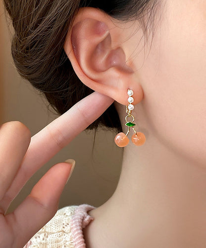 Boucles d'oreilles créoles fantaisie en alliage de cuivre orange et perles de cerisier WH040