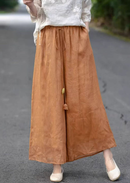 Pantalon court en coton élastique uni orange avec poches et taille haute pour l'été