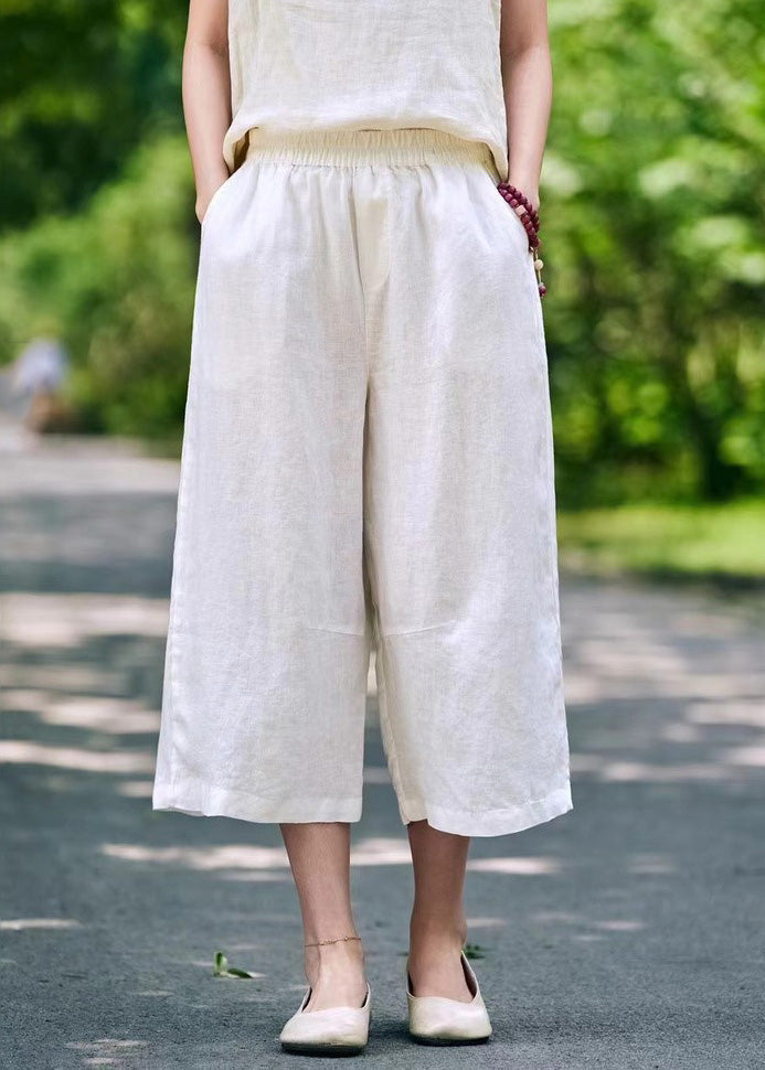 Pantalon d'été court en lin blanc avec poches simples et élastiques
