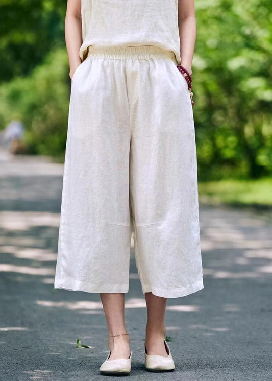 Pantalon d'été court en lin blanc avec poches simples et élastiques