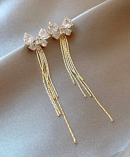 Boucles d'oreilles pendantes fines en alliage d'or et zircons WH041