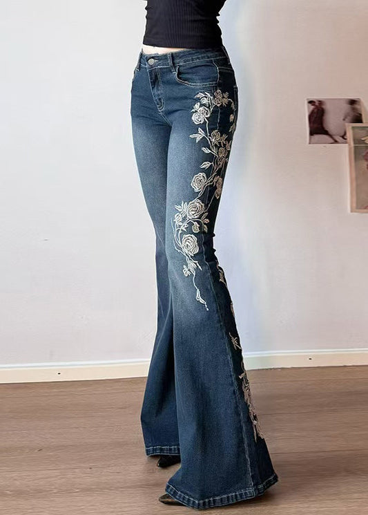 Pantalon bleu brodé en denim taille haute, coupe slim évasée, été