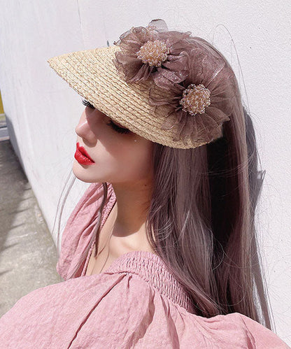 Chapeau pare-soleil élégant en tulle beige avec haut vide et fleur pour l'été YU1026