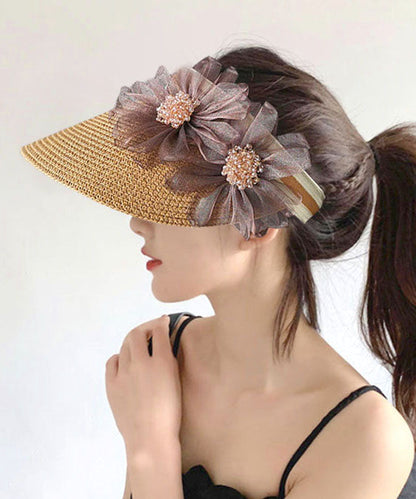 Chapeau pare-soleil élégant en tulle beige avec haut vide et fleur pour l'été YU1026