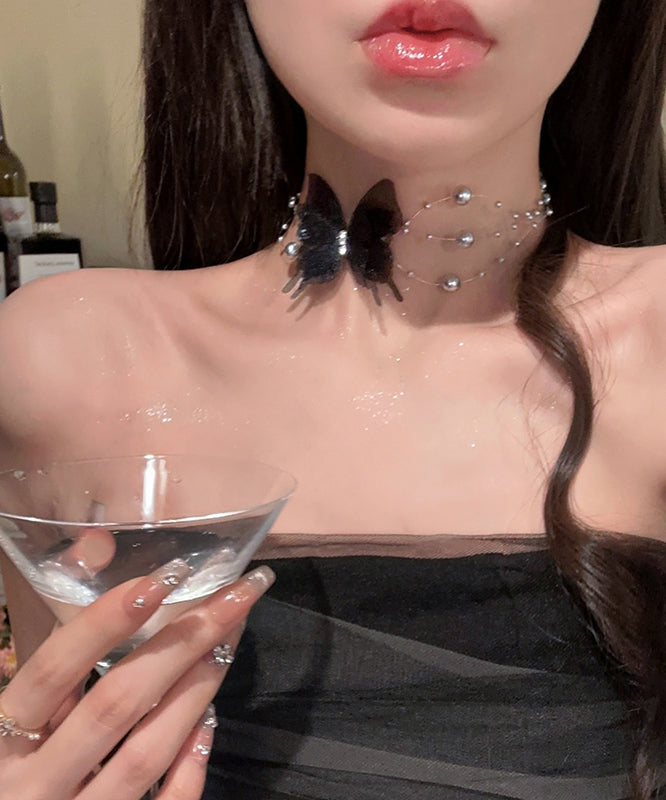 Collier élégant en alliage blanc avec perles de zircon et papillon YU009