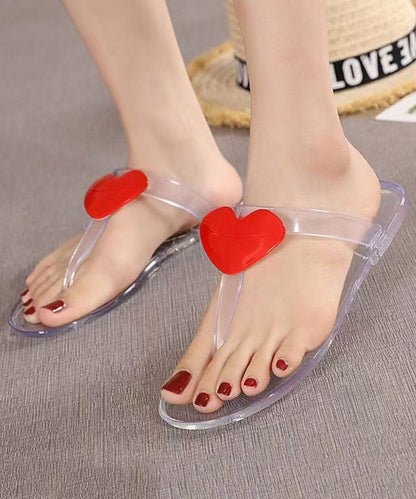 Unique Transparente Flip-Flops mit flachem Boden und schwarzem Herzmuster AG1012